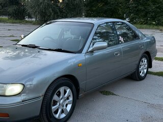 1993 Nissan Bluebird X (U13), серый, 140000 рублей, вид 2