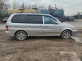 2004 Kia Carnival I Рестайлинг, серый, 400000 рублей - вид 1