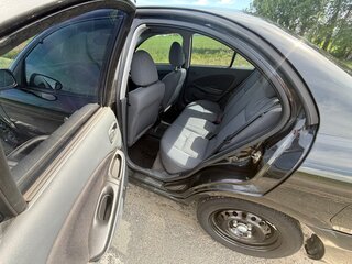 2005 Nissan Almera II (N16) Рестайлинг, чёрный, 379000 рублей, вид 5