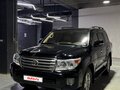 2014 Toyota Land Cruiser 200 Series Рестайлинг 1, чёрный, 4150000 рублей - вид 1