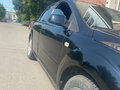 2006 Ford Focus II, чёрный - вид 2