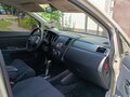 2010 Nissan Tiida I, коричневый - вид 10