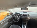 2011 Volkswagen Tiguan I Рестайлинг, красный, 950000 рублей - вид 5