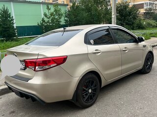 2014 Kia Rio 4-speed III, бежевый, 800000 рублей, вид 1