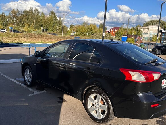 2008 Mitsubishi Lancer X, чёрный, 450000 рублей - вид 3