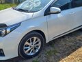2014 Toyota Corolla XI (E160, E170, E180), белый - вид 3