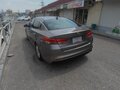 2016 Kia Optima IV, серый, 1675000 рублей - вид 4