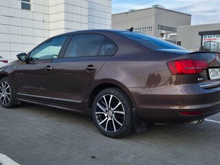 2017 Volkswagen Jetta VI Рестайлинг, коричневый, 1170000 рублей, вид 5