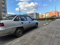2010 Daewoo Nexia I Рестайлинг, серебристый, 160000 рублей - вид 1