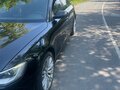 2015 Audi A6 IV (C7) Рестайлинг, чёрный - вид 3