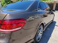 2014 Mercedes-Benz E-Класс 200 IV (W212, S212, C207) Рестайлинг, коричневый - вид 7