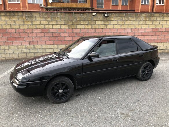 1992 Mazda 323 IV (BG), чёрный, 250000 рублей - вид 3