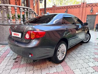 2010 Toyota Corolla X (E140, E150), серый, 990000 рублей, вид 4
