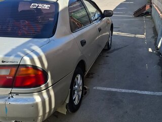 1995 Mazda Familia VII (BH), золотистый, 155000 рублей, вид 3