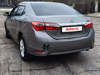 2013 Toyota Corolla XI (E160, E170, E180), золотистый, 1300000 рублей, вид 4