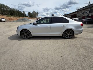 2015 Volkswagen Jetta VI Рестайлинг, серебристый, 880000 рублей, вид 4
