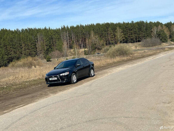 2008 Mitsubishi Lancer X, чёрный, 650000 рублей - вид 35
