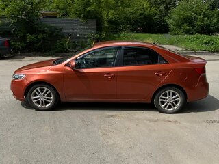 2011 Kia Cerato 5-speed II, оранжевый, 510000 рублей, вид 4