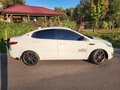 2012 Kia Rio 5-speed III, белый, 810000 рублей - вид 4
