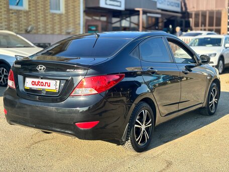 2012 Hyundai Solaris I, чёрный, 650000 рублей, вид 4