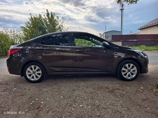 2016 Hyundai Solaris I Рестайлинг, коричневый, 975000 рублей, вид 2