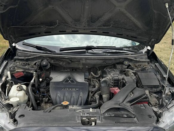 2010 Mitsubishi Lancer X, чёрный, 550000 рублей - вид 9