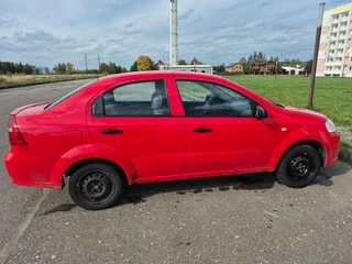 2009 Chevrolet Aveo I Рестайлинг, красный, 230000 рублей, вид 3
