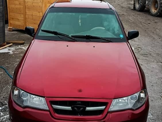 2012 Daewoo Nexia I Рестайлинг, пурпурный, 140000 рублей - вид 3