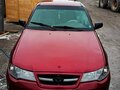 2012 Daewoo Nexia I Рестайлинг, пурпурный, 140000 рублей - вид 3