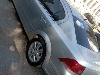 2012 Opel Astra H Рестайлинг, серебристый, 600000 рублей, вид 3