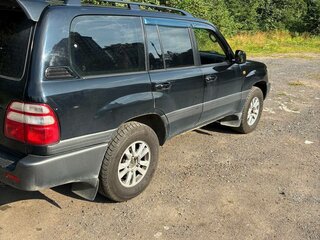2004 Toyota Land Cruiser 100 Series Рестайлинг 1, чёрный, 1750000 рублей, вид 2