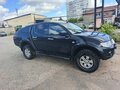 2011 Mitsubishi L200 IV, чёрный - вид 4