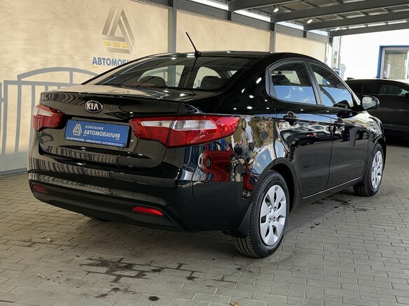 2014 Kia Rio III, чёрный - вид 4