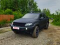 2011 Volkswagen Amarok I, чёрный, 1370000 рублей