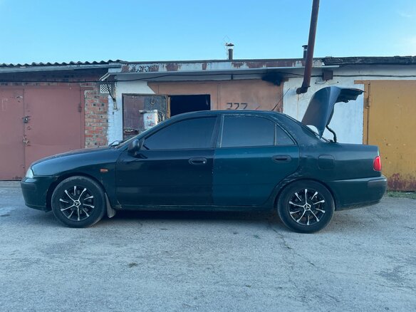 2000 Mitsubishi Carisma I Рестайлинг, зелёный, 247000 рублей - вид 7