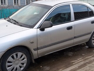 2001 Mitsubishi Carisma I Рестайлинг, серебристый, 350000 рублей, вид 3
