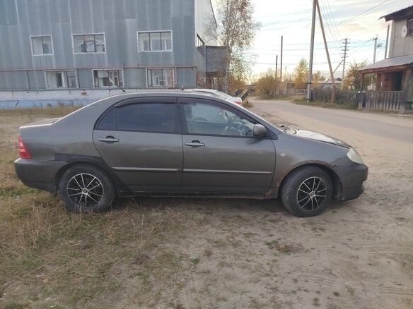 2004 Toyota Corolla IX (E120, E130), серый, 600000 рублей - вид 1