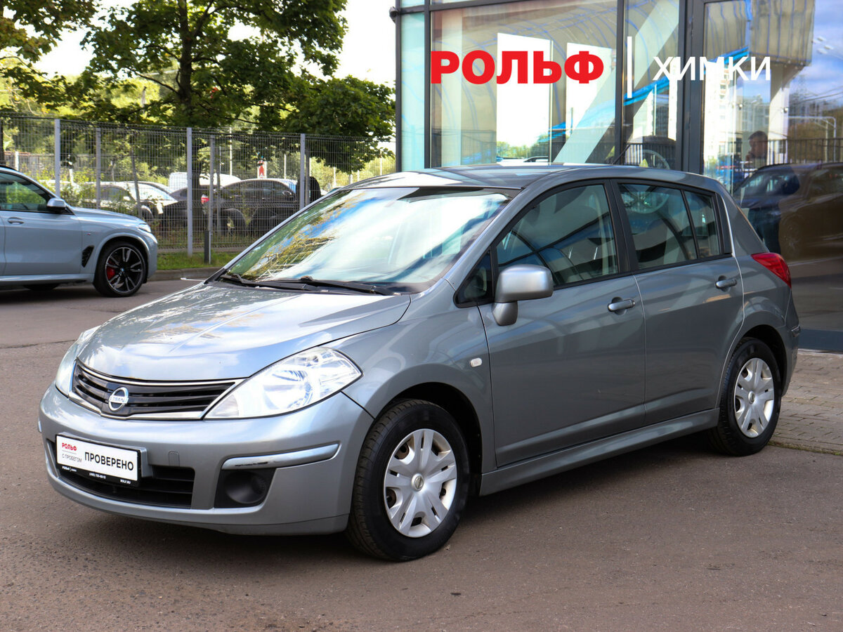Открыть фотографии: Nissan Tiida I Рестайлинг