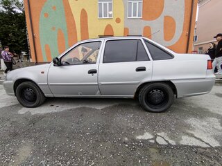 2012 Daewoo Nexia I Рестайлинг, серебристый, 230000 рублей, вид 2