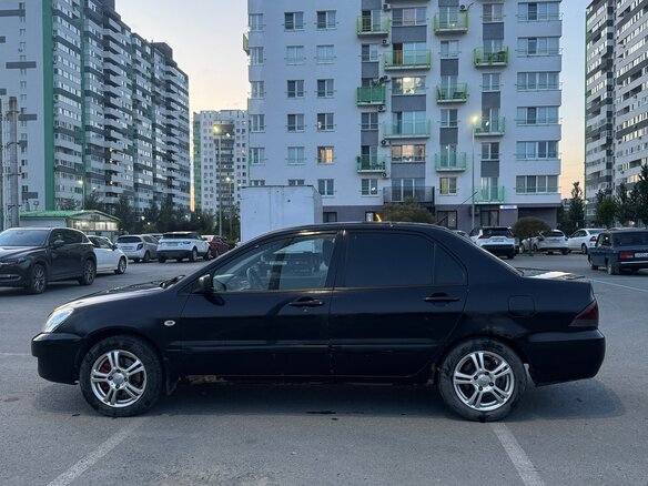 2006 Mitsubishi Lancer IX Рестайлинг, чёрный, 300000 рублей - вид 4