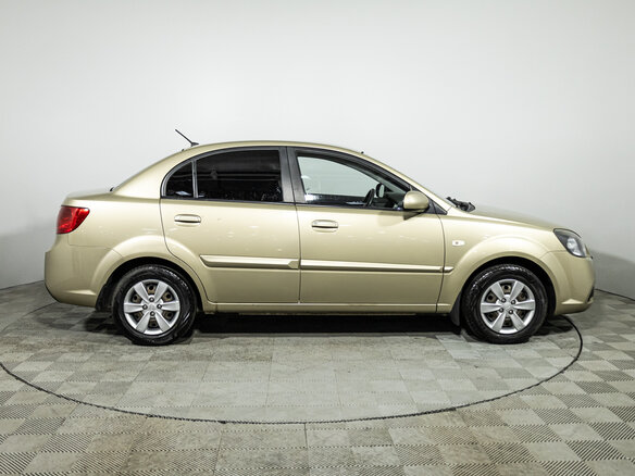 2011 Kia Rio II Рестайлинг, бежевый, 599700 рублей - вид 3
