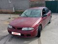 1998 Mitsubishi Carisma I, красный, 89999 рублей