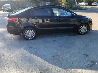2014 Kia Rio III, чёрный, 570000 рублей, вид 4