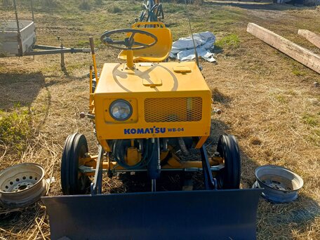 2000 Komatsu WB140, жёлтый, 1000000 рублей, вид 1