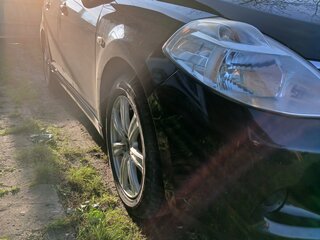2011 Nissan Tiida I Рестайлинг, чёрный, 815000 рублей, вид 4