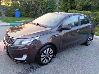 2014 Kia Rio 6-speed III, коричневый, 700000 рублей, вид 1