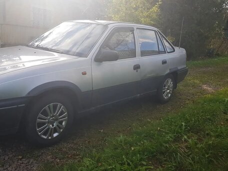 1999 Daewoo Nexia I, серебристый, 110000 рублей, вид 4