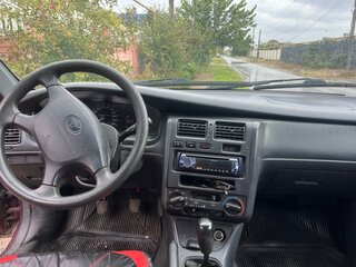 1997 Toyota Carina E, пурпурный, 245000 рублей, вид 2