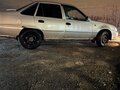 2010 Daewoo Nexia I Рестайлинг, серебристый, 160000 рублей - вид 7