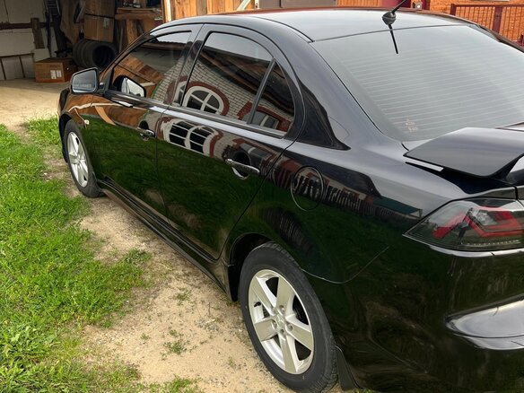 2008 Mitsubishi Lancer X, чёрный, 700000 рублей - вид 4